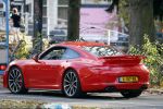 Amsterdam 26 oktober 2022
Bram Moszkowicz in zijn rode porsche 911 in Amsterdam centrum.