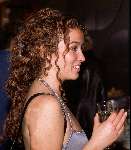 Katja Schuurman met glas champagne in haar hand
19 November 1999
