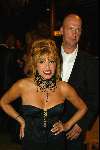 Aalsmeer 8 november 2002
Modeshow la Perla
Patricia Paay met haar beveiligingsman