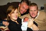 Castricum 27 november 2003
Nicky LaCroix en Frank la Croix met hun zoontje Oliver en met opa Henny Huisman.