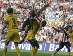 Eindhoven, 20 Oktober 2006 
Kompetitiewedstrijd PSV-Roda JC Seizoen 2006/2007
Eindstand 4-1
Alex PSV in de aanval hangend op de rug van Pa Modou Kah