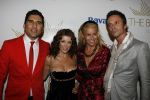 Amsterdam 30 september 2006
Openingsfeest A1 grand Prinx in Onassis.
  Danni Minoque met Angela Kluivert Rodrigo Otazu en Eric Kuster