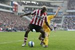 Eindhoven, 20 Oktober 2006 
Kompetitiewedstrijd PSV-Roda JC Seizoen 2006/2007
Eindstand 4-1
Arouna Kone in duel met Marcel de Jong