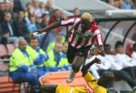 Eindhoven, 15 Oktober 2006 PSV-Roda JC, eindstand 4-1
Kompetitie Seizoen 2006/2007
Arouna Kone wordt onderuit gehaald door Pa Modou Kah