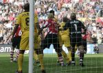 Eindhoven, 20 Oktober 2006 
Kompetitiewedstrijd PSV-Roda JC Seizoen 2006/2007
Eindstand 4-1
Arouna Kone wordt aan zijn shirt getrokken door Davy de Fauw (12) 
Shirtje trekken
