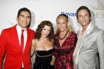 Amsterdam 30 september 2006
Openingsfeest A1 grand Prinx in Onassis.
  Danni Minoque met Angela Kluivert Rodrigo Otazu en Eric Kuster