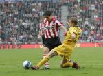 Eindhoven, 20 Oktober 2006 
Kompetitiewedstrijd PSV-Roda JC Seizoen 2006/2007
Eindstand 4-1
Ibrahim Afellay wordt onderuit gehaald door Marcel de Jong