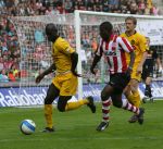 Eindhoven, 20 Oktober 2006 
Kompetitiewedstrijd PSV-Roda JC Seizoen 2006/2007
Eindstand 4-1PSV 
Jefferson Farfan probeert Pa Modou Kah de bal te ontfutselen