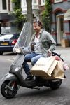 Amsterdam 17 september 2011
Leco v Zadelhoff met boodschappen tassen op vespa scooter.
Peter Smulders bv