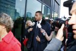 Amsterdam 10 oktober 2013
Rechtzaak Badr Hari bij de rechtbank op de paranassusweg waar veel pers op afgekomen is. Badr arriveert met zijn advocaat Benedicte Ficq