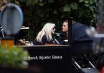 Amsterdam 9 oktober 2013
Suze mens met haar moeder Suze en zus op terras met kinderwagen met daarin haar baby.