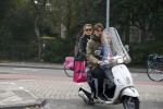 Amsterdam 7 oktober 2013
Daniel de Ridder met Tatum Dagelet en Toy Travis op de vespa scooter.