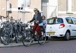 Amsterdam 7 oktober 2014
Chantal janzen met zoontje James op de fiets.