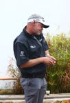 Vilamoura 10-11-12 Oktober 2014
Portugal Masters op GC Victoria
Vanwege de zware regenval gereduceerd van 72 naar 36 Holes
Darren Clark met mobiele telefoon en sigaret
Foto Peter Smulders BV