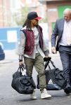 Amsterdam 7 oktober 2014
Edgar Davids met tassen op weg naar vliegveld met taxi.