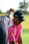 Vilamoura 10-11-12 Oktober 2014
Portugal Masters op GC Victoria
Vanwege de zware regenval gereduceerd van 72 naar 36 Holes
Jeev Milkha Sing met zijn caddie op de driving Range
Foto Peter Smulders BV