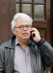 Amsterdam 9 oktober 2014
Theodor Holman bellend op straat