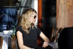 Amsterdam 30 september 2015 
Doutzen Kroes met manager Sarah Keller en PA op terras.