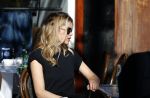 Amsterdam 30 september 2015 
Doutzen Kroes met manager Sarah Keller en PA op terras.
