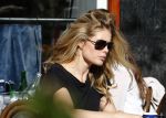 Amsterdam 30 september 2015 
Doutzen Kroes met manager Sarah Keller en PA op terras.