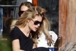 Amsterdam 30 september 2015 
Doutzen Kroes met manager Sarah Keller en PA op terras.