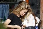 Amsterdam 30 september 2015 
Doutzen Kroes met manager Sarah Keller en PA op terras.