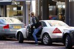 Amsterdam 30 september 2015 
Manuel Broekman met een kennis en in zijn mercedes cabrio op de pc hooftstraat
