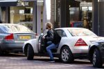 Amsterdam 30 september 2015 
Manuel Broekman met een kennis en in zijn mercedes cabrio op de pc hooftstraat