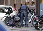 Amsterdam 19 september 2015  
Victor Reinier met zijn dochter op de fiets