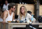 Amsterdam 12 september 2016 
Tim Douwsma en zijn vriendin Jessie Jazz Vuijk op terras en op de scooter
