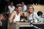Amsterdam 12 september 2016 
Tim Douwsma en zijn vriendin Jessie Jazz Vuijk op terras en op de scooter