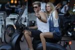 Amsterdam 12 september 2016 
Tim Douwsma en zijn vriendin Jessie Jazz Vuijk op terras en op de scooter
