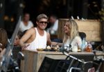 Amsterdam 12 september 2016 
Tim Douwsma en zijn vriendin Jessie Jazz Vuijk op terras en op de scooter