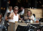 Amsterdam 12 september 2016 
Tim Douwsma en zijn vriendin Jessie Jazz Vuijk op terras en op de scooter