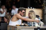 Amsterdam 12 september 2016 
Tim Douwsma en zijn vriendin Jessie Jazz Vuijk op terras en op de scooter