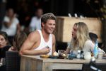 Amsterdam 12 september 2016 
Tim Douwsma en zijn vriendin Jessie Jazz Vuijk op terras en op de scooter