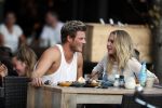Amsterdam 12 september 2016 
Tim Douwsma en zijn vriendin Jessie Jazz Vuijk op terras en op de scooter