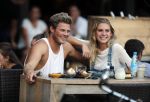 Amsterdam 12 september 2016 
Tim Douwsma en zijn vriendin Jessie Jazz Vuijk op terras en op de scooter