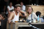 Amsterdam 12 september 2016 
Tim Douwsma en zijn vriendin Jessie Jazz Vuijk op terras en op de scooter