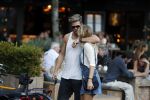 Amsterdam 12 september 2016 
Tim Douwsma en zijn vriendin Jessie Jazz Vuijk op terras en op de scooter