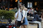Amsterdam 12 september 2016 
Tim Douwsma en zijn vriendin Jessie Jazz Vuijk op terras en op de scooter
