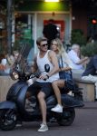 Amsterdam 12 september 2016 
Tim Douwsma en zijn vriendin Jessie Jazz Vuijk op terras en op de scooter