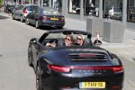 Amsterdam 26 augustus 2019
Sonja Bakker en haar vriend Barry v Suijdam in een porsche 911 cabrio in Amsterdam zuid