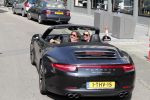 Amsterdam 26 augustus 2019
Sonja Bakker en haar vriend Barry v Suijdam in een porsche 911 cabrio in Amsterdam zuid