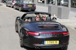 Amsterdam 26 augustus 2019
Sonja Bakker en haar vriend Barry v Suijdam in een porsche 911 cabrio in Amsterdam zuid