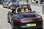 Amsterdam 26 augustus 2019
Sonja Bakker en haar vriend Barry v Suijdam in een porsche 911 cabrio in Amsterdam zuid