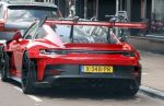 Amsterdam 26 augustus 2026
Logo's van de winkels op de pc hooftstraat . DE Winkelstraat van Nederland . Speciale Porsche 911 van Steven Bergwijn