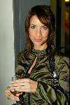 Amsterdam 27 oktober 2003
Presentatie 10 jaar jewels & Watches
Renee Vervoorn met glaasje champagne