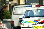 Amsterdam 21 oktober 2003
Victor Reinier met politie  op cornelis schuytstraat