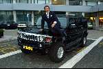 Amsterdam 2 oktober 2003
Emile Ratelband op zijn Hummer Automobiel